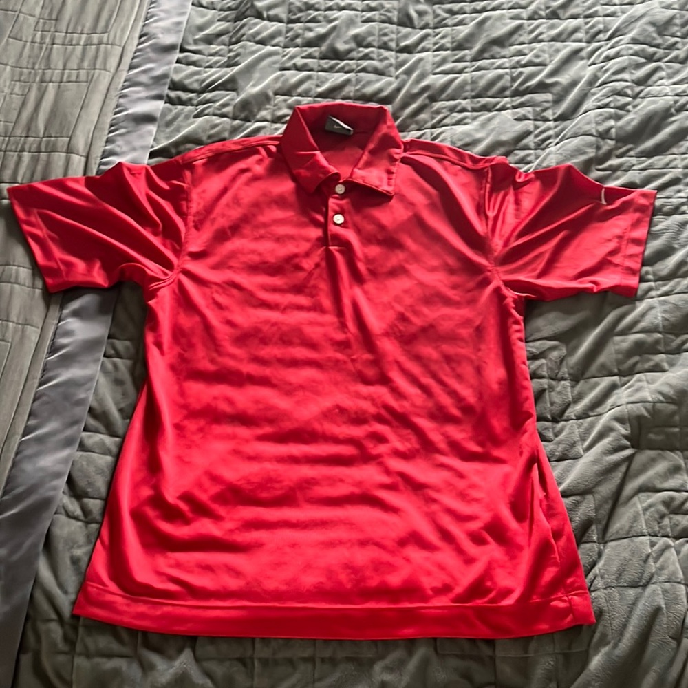 Nike golf shirt.